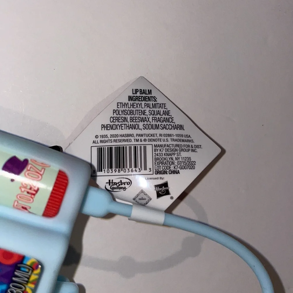 Monopoly carrying case with hand sanitizer and lip balm